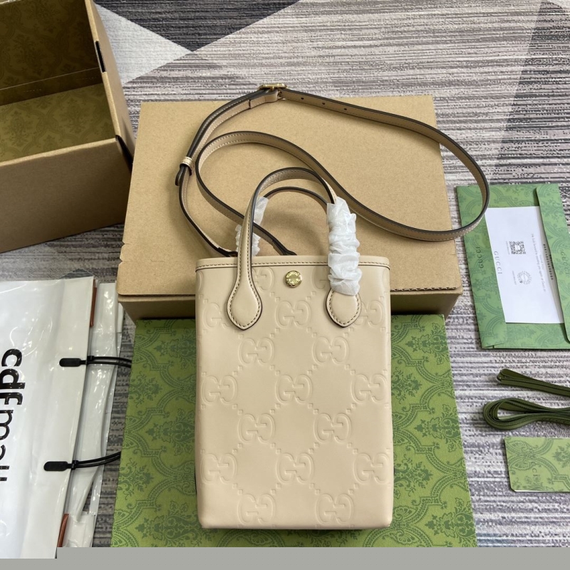 G*u*i top handle bags